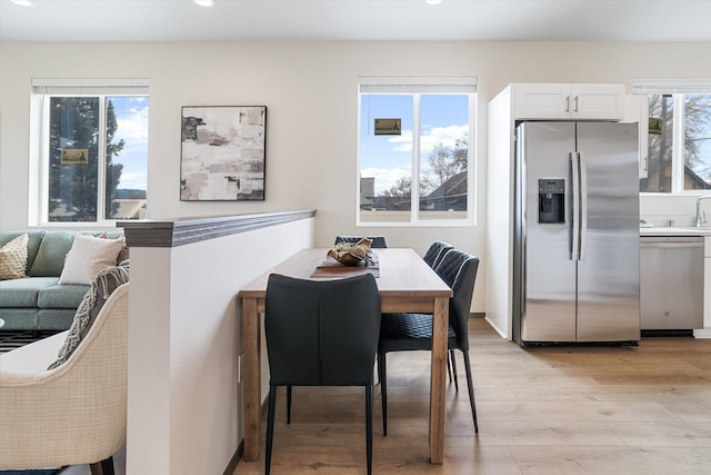 2519 N Columbus Rd, Spokane, WA 99207 - dining area with light wood-style floors and recessed lighting