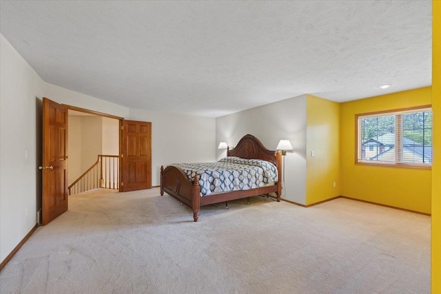 15116 N Edencrest Dr, Spokane, WA 99208 - bedroom featuring carpet floors and a textured ceiling