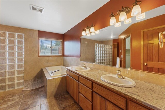 15116 N Edencrest Dr, Spokane, WA 99208 - full bathroom with a garden tub, double vanity, and walk in shower
