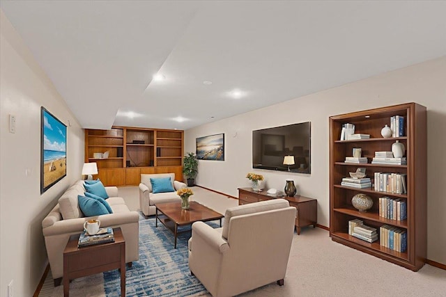 15116 N Edencrest Dr, Spokane, WA 99208 - living room featuring built in shelves, light carpet, and recessed lighting