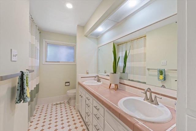 3410 S Napa St, Spokane, WA 99203 - full bath featuring double vanity and tile patterned floors
