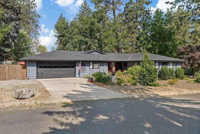 3410 S Napa St, Spokane, WA 99203 - ranch-style home with an attached garage and driveway