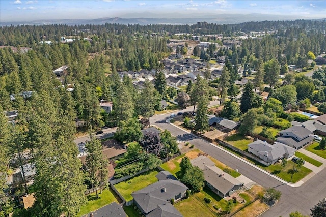 3410 S Napa St, Spokane, WA 99203 - aerial overview of property's location with a forest and nearby suburban area