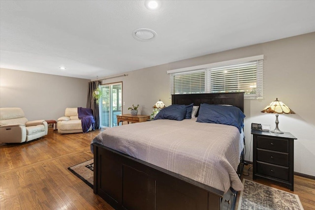3410 S Napa St, Spokane, WA 99203 - bedroom featuring wood finished floors, access to outside, and recessed lighting