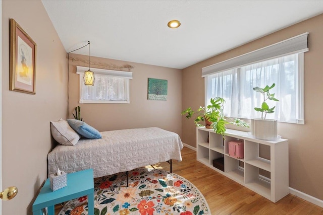 3410 S Napa St, Spokane, WA 99203 - bedroom featuring multiple windows and wood finished floors