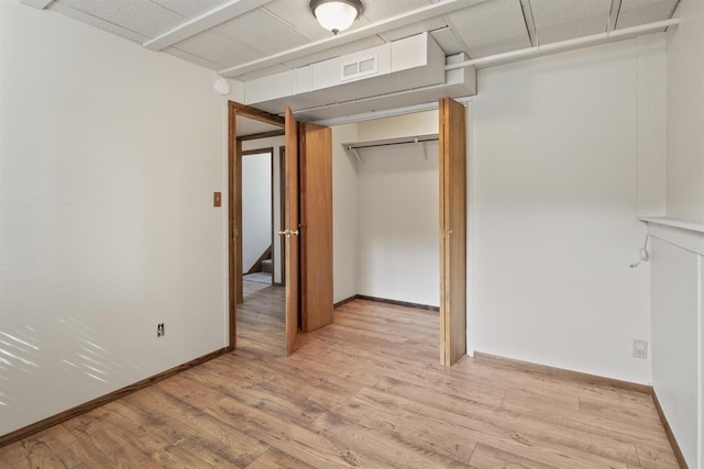 14417 N Dakota Rd, Spokane, WA 99208 - unfurnished bedroom featuring light wood-style floors and a closet