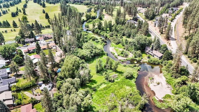14417 N Dakota Rd, Spokane, WA 99208 - aerial view of property and surrounding area featuring a nearby body of water and a tree filled landscape