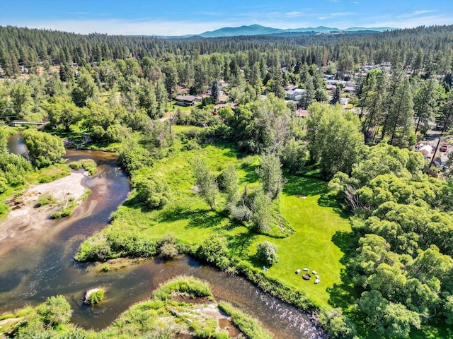 14417 N Dakota Rd, Spokane, WA 99208 - aerial view of property and surrounding area with a heavily wooded area and a mountainous background