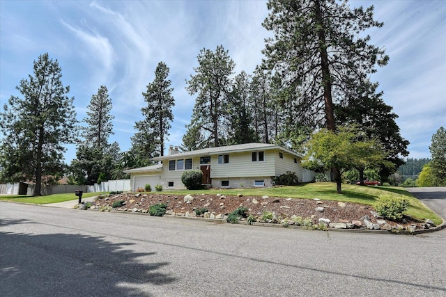 9405 N Normandie Ln, Spokane, WA 99218 - view of front of house featuring an attached garage and driveway