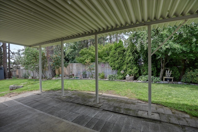 9405 N Normandie Ln, Spokane, WA 99218 - fenced backyard featuring a patio area