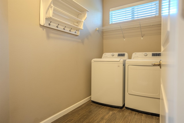 2303 W Bridge Ave, Spokane, WA 99201 - laundry room with washer and clothes dryer and dark wood-type flooring