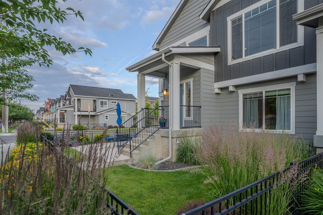 2303 W Bridge Ave, Spokane, WA 99201 - view of property exterior with board and batten siding and a residential view