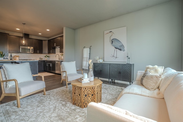 2303 W Bridge Ave, Spokane, WA 99201 - living room with light wood-style floors and recessed lighting