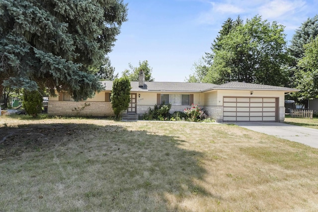 11324 E 36th Ave, Spokane Valley, WA 99206 - single story home with a garage, a front lawn, concrete driveway, and a chimney