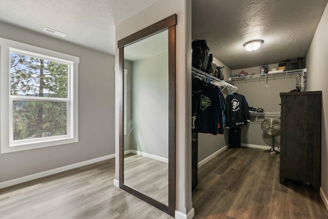 4513 S Crows Nest Ln, Spokane, WA 99206 - spacious closet featuring wood finished floors