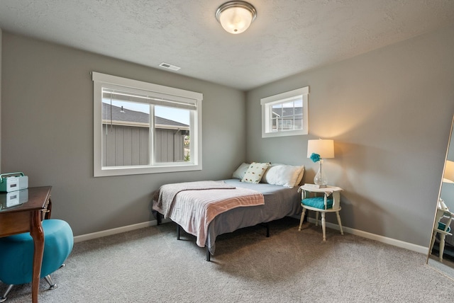 4513 S Crows Nest Ln, Spokane, WA 99206 - carpeted bedroom with multiple windows