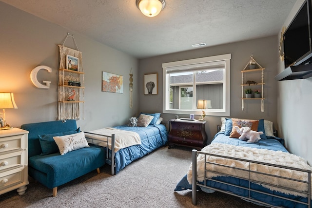 4513 S Crows Nest Ln, Spokane, WA 99206 - carpeted bedroom with a textured ceiling