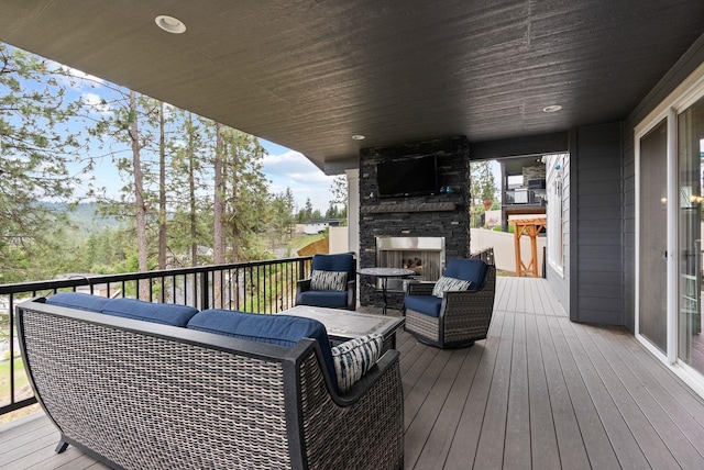 4513 S Crows Nest Ln, Spokane, WA 99206 - wooden terrace featuring an outdoor living space with a fireplace