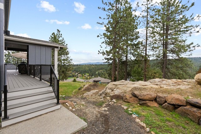 4513 S Crows Nest Ln, Spokane, WA 99206 - view of yard featuring a wooden deck