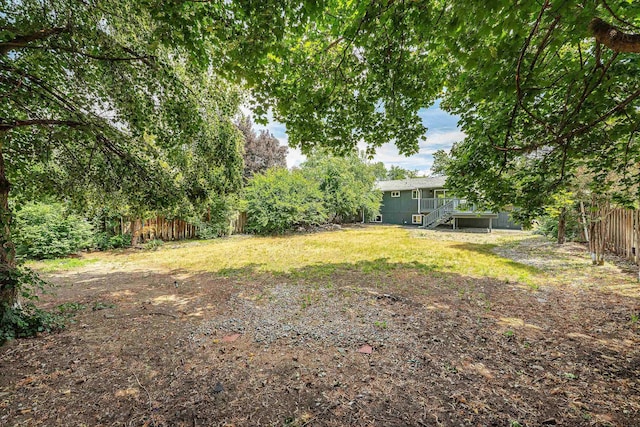 7721 N Wilding Dr, Spokane, WA 99208 - fenced backyard with stairs