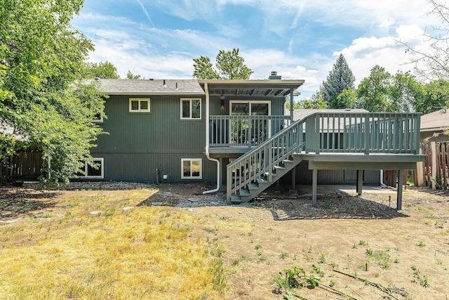 7721 N Wilding Dr, Spokane, WA 99208 - rear view of property with stairs and a deck