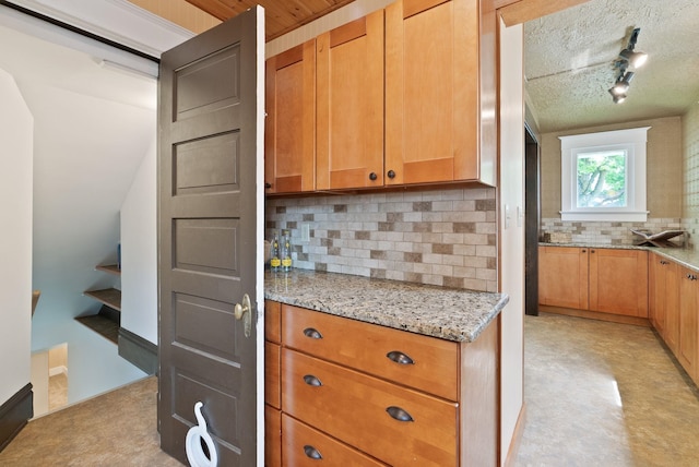 1315 N Hollis St, Spokane, WA 99201 - kitchen with decorative backsplash and light stone countertops