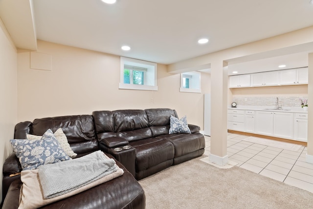 1315 N Hollis St, Spokane, WA 99201 - living area with light tile patterned flooring, recessed lighting, light colored carpet, and bar