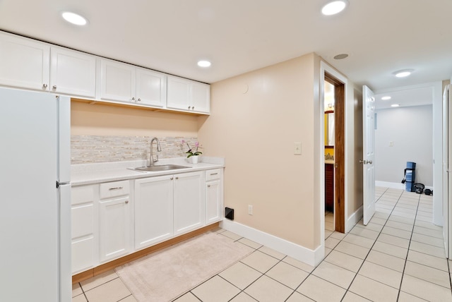 1315 N Hollis St, Spokane, WA 99201 - bar with freestanding refrigerator, light tile patterned flooring, tasteful backsplash, and recessed lighting