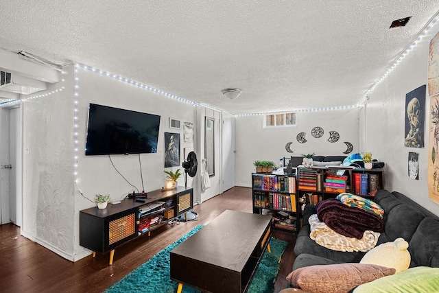 1630 E Broad Ave, Spokane, WA 99207 - living area with a textured ceiling and wood finished floors