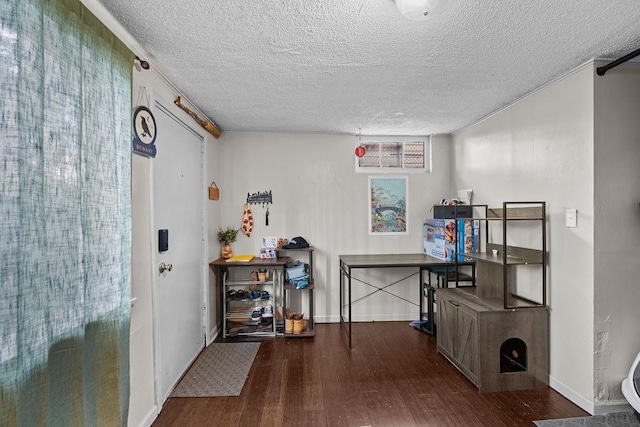 1630 E Broad Ave, Spokane, WA 99207 - miscellaneous room featuring wood finished floors and a textured ceiling