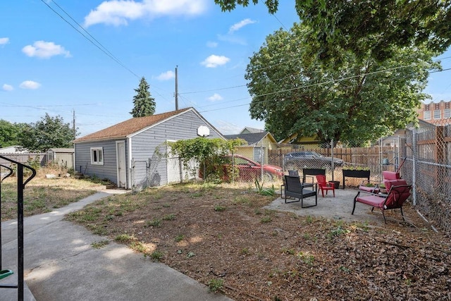 1630 E Broad Ave, Spokane, WA 99207 - fenced backyard featuring a patio