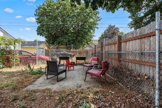 1630 E Broad Ave, Spokane, WA 99207 - fenced backyard featuring a patio area