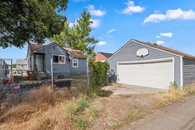 1630 E Broad Ave, Spokane, WA 99207 - view of front of property featuring a detached garage and an outdoor structure