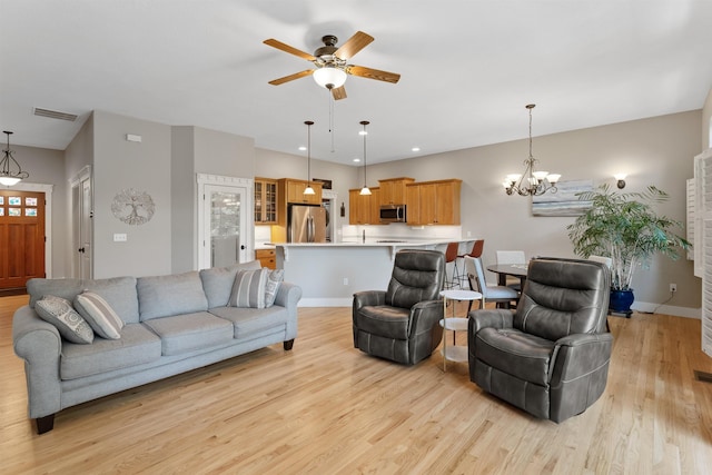718 W Qualchan Ln, Spokane, WA 99224 - living room with light wood finished floors, a chandelier, ceiling fan, and recessed lighting