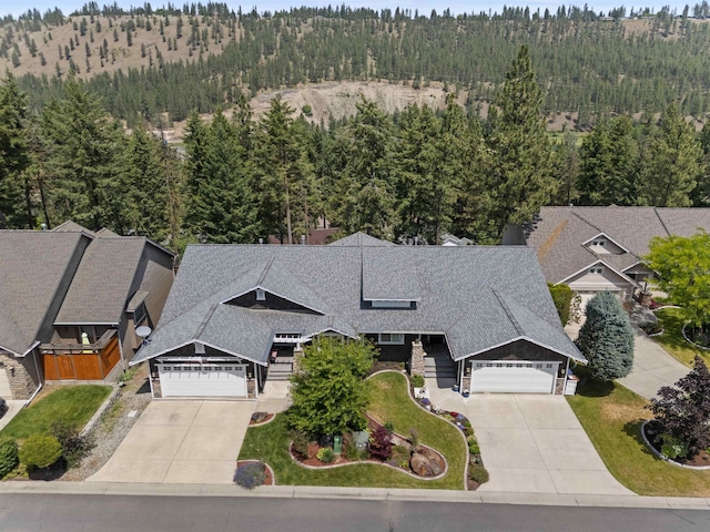 718 W Qualchan Ln, Spokane, WA 99224 - view of subject property with a heavily wooded area