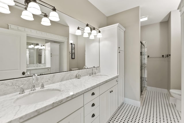718 W Qualchan Ln, Spokane, WA 99224 - full bathroom with double vanity, a shower stall, and tile patterned floors