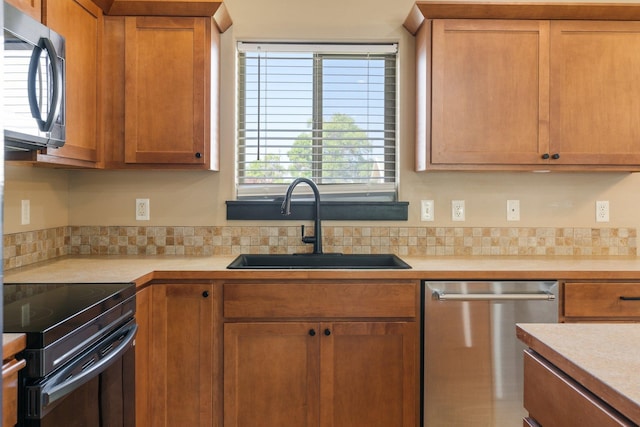 1819 N Center Ln, Spokane Valley, WA 99212 - kitchen with dishwasher, electric range, light countertops, and tasteful backsplash