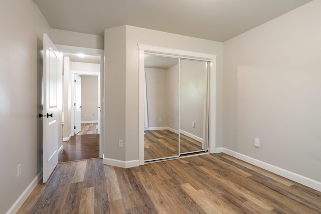 1819 N Center Ln, Spokane Valley, WA 99212 - unfurnished bedroom with wood finished floors and a closet