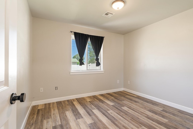1819 N Center Ln, Spokane Valley, WA 99212 - unfurnished room featuring wood finished floors and baseboards