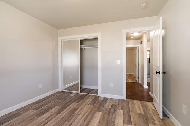 1819 N Center Ln, Spokane Valley, WA 99212 - unfurnished bedroom with wood finished floors and a closet