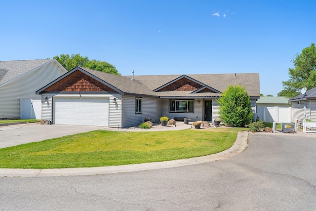 1819 N Center Ln, Spokane Valley, WA 99212 - view of front of property with an attached garage, driveway, roof with shingles, and a gate