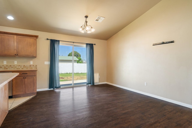 1819 N Center Ln, Spokane Valley, WA 99212 - unfurnished dining area featuring a chandelier, lofted ceiling, wood finished floors, and recessed lighting