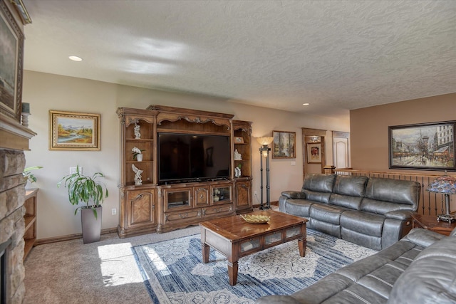 5908 N Bridget Rd, Spokane, WA 99208 - living room featuring a stone fireplace, light carpet, recessed lighting, and a textured ceiling