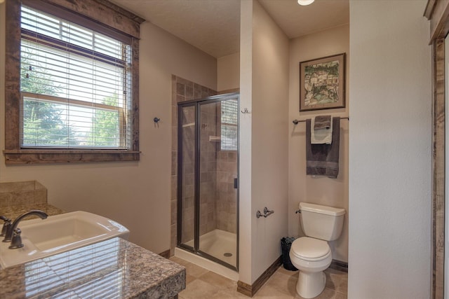 5908 N Bridget Rd, Spokane, WA 99208 - full bathroom featuring plenty of natural light, a stall shower, and tile patterned floors