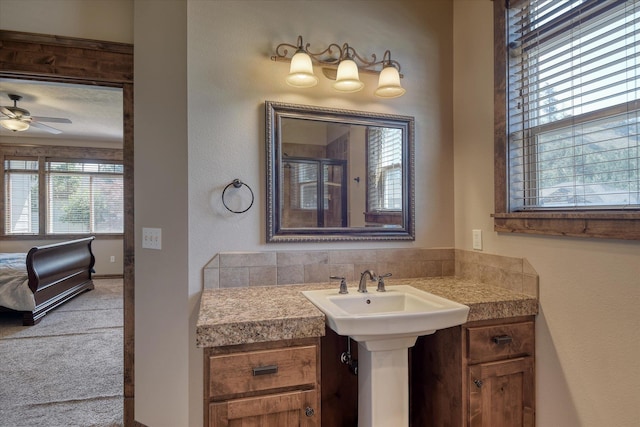 5908 N Bridget Rd, Spokane, WA 99208 - bathroom featuring ceiling fan, connected bathroom, and a shower