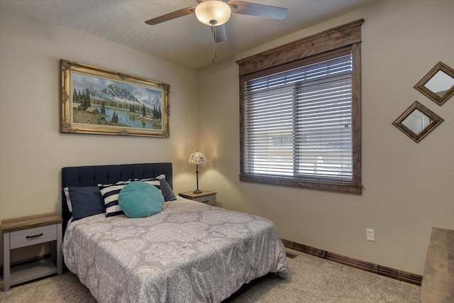 5908 N Bridget Rd, Spokane, WA 99208 - bedroom with carpet floors and a ceiling fan
