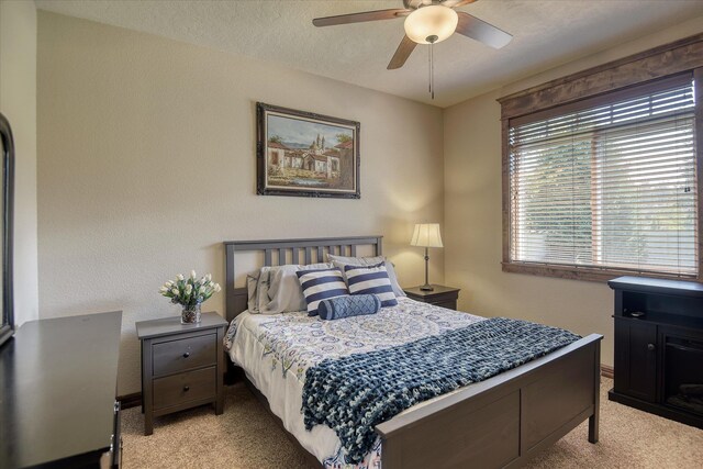5908 N Bridget Rd, Spokane, WA 99208 - carpeted bedroom featuring baseboards and ceiling fan