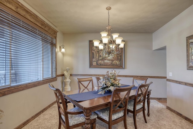 5908 N Bridget Rd, Spokane, WA 99208 - dining space featuring light colored carpet and a chandelier