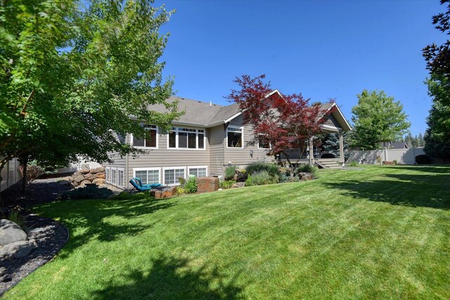 5908 N Bridget Rd, Spokane, WA 99208 - property entrance with covered porch, stone siding, and a shingled roof