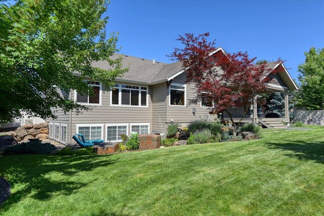 5908 N Bridget Rd, Spokane, WA 99208 - back of house with a fenced backyard and a wooden deck
